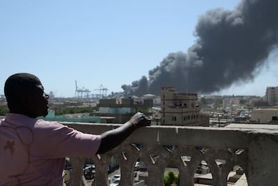 Smoke billows after a drone strike on the port of Port Sudan on May 6, 2025. AFP