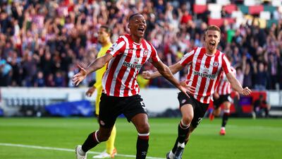 Ethan Pinnock celebrates after scoring their Brentford's first goal. Getty