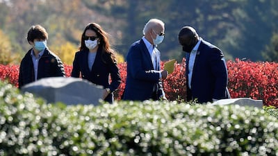 President-elect Joe Biden and his daughter Ashley Biden leave after visiting their family grave at St. Joseph on the Brandywine Roman Catholic Church in Wilmington, Delaware. AFP