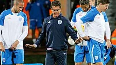 Fabio Capello, England's coach, directs his players during training yesterday.