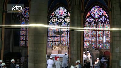 The first Mass is celebrated in a side chapel, two months after a devastating fire engulfed the Notre-Dame de Paris cathedral, Saturday June 15, 2019, in Paris. AP