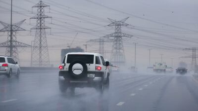Motorists on a road in the January rain in Al Quoz, Dubai. Khushnum Bhandari / The National