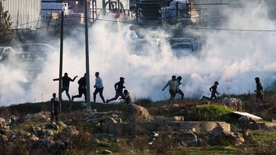 Israeli forces fire tear gas to disperse demonstrators near Beit El in the occupied West Bank. AFP