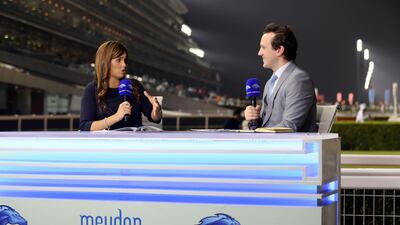 Laura King and Jon Ivan-Duke from Dubai Racing channel at Meydan. Chris Whiteoak / The National