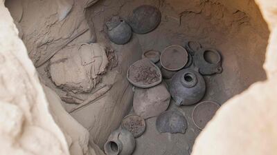 Other objects found during the dig include ceramic pots and knitting gear. AFP