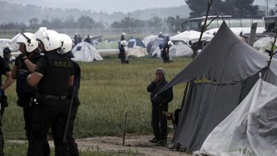 In recent weeks, the camp had begun taking on an image of permanence, with refugees setting up small makeshift shops selling everything from cooking utensils to falafel and bread. Yannis Kolesidis / Reuters