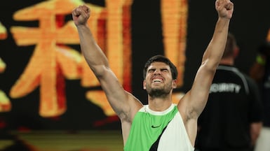 Carlos Alcaraz celebrates after beating Alex De Minaur in the Australian Open quarter-finals. Reuters