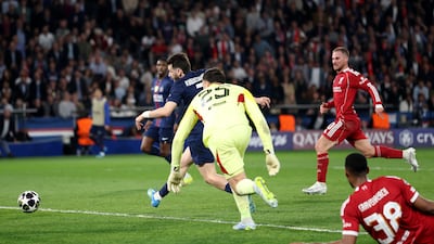 Khvicha Kvaratskhelia rounds Giorgi Mamardashvili before scoring. Getty Images