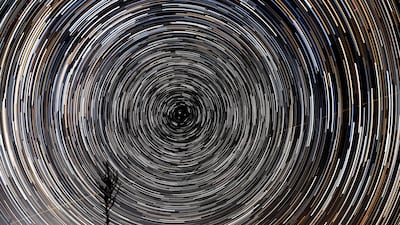 A composite of 480 stacked long-exposure images shows Geminid meteors streaking across the night sky over the Skopska Crna Gora mountain, about 45km north of the capital Skopje, North Macedonia. EPA