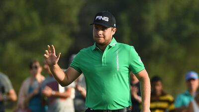 Abu Dhabi HSBC Championship leader Tyrrell Hatton will tee off alongside Dustin Johnson and Pablo Larrazabal in the final group at 12.01pm. Ross Kinnaird / Getty Images