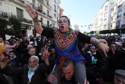 Algerians march through the streets of Algiers on 22 February, 2020. Algeria has been rocked by a popular protest movement for over a year. Mohamed Messara / EPA