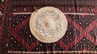 Khoos palm fronds are woven into crafts and household products such as fans, brooms and mats. Reem Mohammed / The National