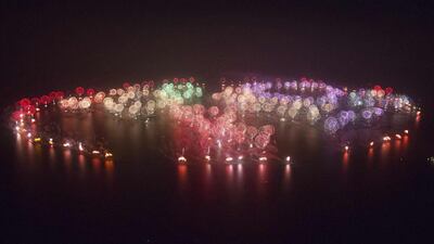 Fireworks explode in the sky across the whole of The Palm Jumeirah and the The World Islands. Roy Riley / Dubai World Record 2014 /Handout via Reuters