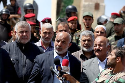 Tawfik Abu Naim, centre. Getty Images