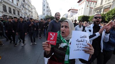 Algerians chant slogans during a protest rally in Algiers, Algeria. Thousands of people have taken to the streets in the capital Algiers calling for a mass boycott of the country's presidential elections, which is taking place on the day, and to voice against the five candidates running to replace ousted president Abdelaziz Bouteflika for being closely linked to the former regime. EPA