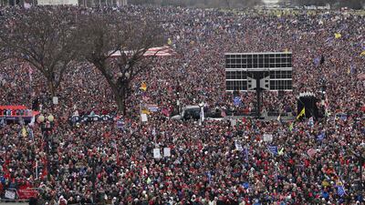 Supporters as US President Donald J Trump delivers remarks to supporters gathered to protest Congress' upcoming certification of Joe Biden as the next president on the Ellipse in Washington, DC, USA. EPA