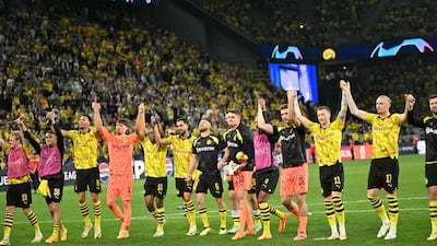 Dortmund players applaud the fans after beating PSG in the Champions League semi-final first leg. AFP