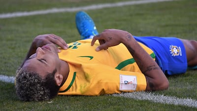 Brazil forward Neymar lies flat on his back during the 2018 World Cup qualifier against Bolivia. Nelson Almeida / AFP