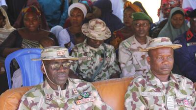 Nigerian Military officials are seen at the Giwa military barracks, where inmates were released for rehabilitation and integration after they were detained over suspicion of links with militants on November 27, 2019. AFP