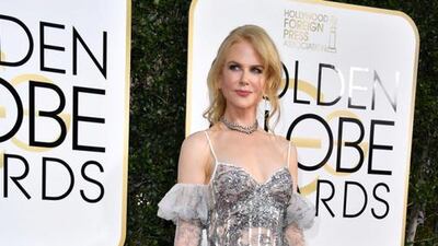Nicole Kidman looked as elegant as ever in a silver-sequinned, embroidered ivory gown with a distressed tulle train from Alexander McQueen’s spring/summer 2017 collection. Courtesy of Alexander McQueen