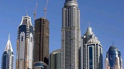 Dubai Marina is home to some of Dubai's tallest buildings and is still in demand despite the delivery of hundreds of new apartments. Satish Kumar / The National