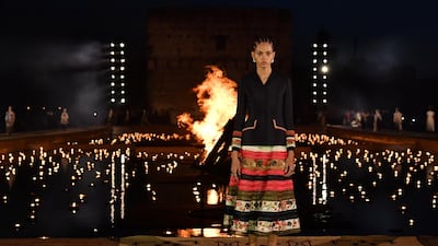 A model walks the runway during the Christian Dior Cruise 2020 show. Getty Images