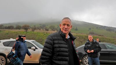 Retired Israeli army general Benny Gantz (C), one of the leaders of the Blue and White political alliance, is seen during a tour near the Syrian border in the Israeli-annexed Golan Heights, on March 4, 2019. AFP