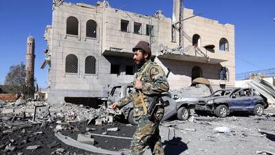 A Houthi fighter inspects a rebel-held detention centre after it was hit by alleged air strike in Sanaa on December 13, 2017. Yahya Arhab / EPA