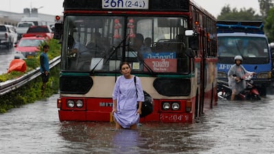 Vehicles are submerged in flood water after heavy rain in Bangkok. AFP