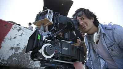 The Emirati filmmaker Ali F Mostafa on the set of his film, From A to B. Silvia Razgova / The National