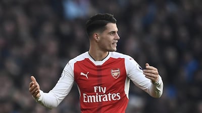 Arsenal's Granit Xhaka looks dejected after being sent off against Burnley. Dylan Martinez / Reuters