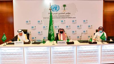 Saudi Minister of Foreign Affairs Prince Faisal bin Farhan Al Saud (C) and advisor to the Saudi Royal Court Abdullah Al Rabeeah (L) attending a virtual meeting for the High-Level Pledging Event For The Humanitarian Crisis in Yemen 2020, in the Saudi capital Riyadh. AFP