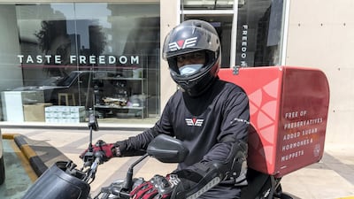 The safety of delivery riders is more important than getting food delivered on time to the vast majority of UAE residents according to a new survey. Antonie Robertson / The National