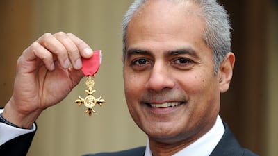 Newsreader George Alagiah at Buckingham Palace after collecting his OBE from the queen in 2008. PA