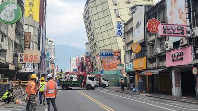 A hotel building in Hualien, damaged in an earthquake on April 3, tilts further to one side after a series of overnight tremors rocked Taiwan. AFP