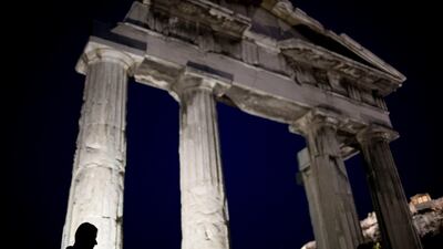 The International Monetary Fund says its latest $1.8bn Greek bailout is contingent on debt relief being provided by euro-area countries Petros Giannakouris / AP Photo