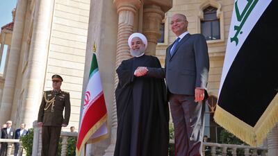 Iran's President Hassan Rouhani, seen here with Iraqi President Barham Salih, arrived in Iraq for his first official visit, as Baghdad comes under pressure from Washington to limit political and trade ties with its neighbour. AFP