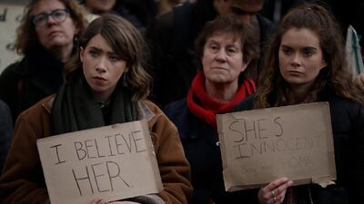 Protesters in London listen to a speech at the demonstration. AP