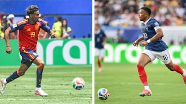 Spain's forward Lamine Yamal, left, and France captain Kylian Mbappe clash in Arlington for a place in the World Cup final. AFP