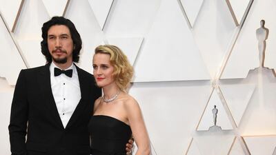 Adam Driver, wearing Burberry, and Joanne Tucker arrive at the Oscars on Sunday, February 9, 2020, at the Dolby Theatre in Los Angeles. AP