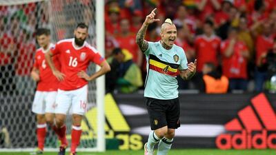 Radja Nainggolan celebrates scoring the opening goal. Matthias Hangst / Getty Images