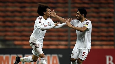 Amer Abdulrahman, right, will join UAE teammate and good friend Omar, left, at Al Ain ahead of the next Arabian Gulf League season. Manan Vatsyayana / AFP
