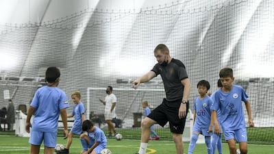 More than 1,000 boys and girls in the UAE take part in the Manchester City Football Schools programme, which has been running for 10 years across the UAE. Khushnum Bhandari / The National Reporter: Gillian Duncan News