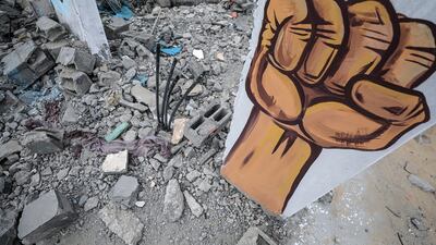 A mural included in the exhibition entitled 'Occupation Kills Childhood' in Gaza. EPA