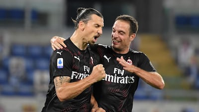 Zlatan Ibrahimovic celebrates with teammate Giacomo Bonaventura after scoring Milan's second goal from the penalty spot in their 3-0 Serie A victory over Lazio at the Stadio Olimpico on Saturday, July 4. Reuters