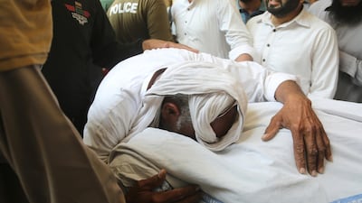 A man mourns the death of his family member outside a hospital in Lahore, Pakistan. A suicide bomber attacked security forces guarding a famous Sufi shrine in Pakistan's eastern city of Lahore, police said. AP Photo
