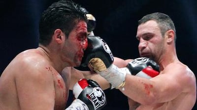 A bloodied Manuel Charr fails to find a way through to stop Vitali Klitschko during the Ukrainian's WBC title defence in Moscow