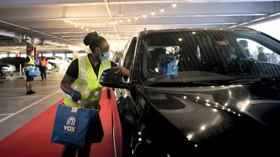 The drive-in cinema is making a comeback at Mall Of The Emirates, and a large screen has been assembled in the shopping centre's upper parking lot, on level 3, right underneath Ski Dubai's slope. Patrons take position, switch off their engines and settle in for the film. Reem Mohammed / The National