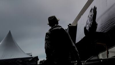 A poster for the 76th Cannes Film Festival featuring a photograph of actress Catherine Deneuve, on the facade of the Palais des Festivals, in Cannes south-eastern France. AFP
