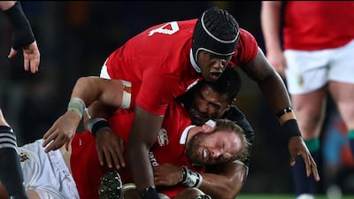 Alun Wyn Jones of the Lions is felled by a high tackle from Jerome Kaino of the All Blacks during their third Test. Hannah Peters / Getty Images